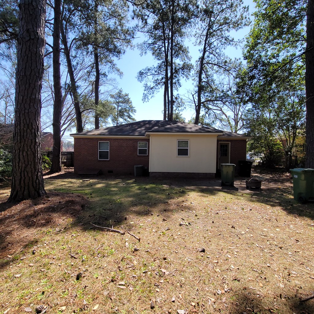 1547 38th Street Columbus, GA 31904 - Photo 2 of 24 a view of a house with a yard covered with snow