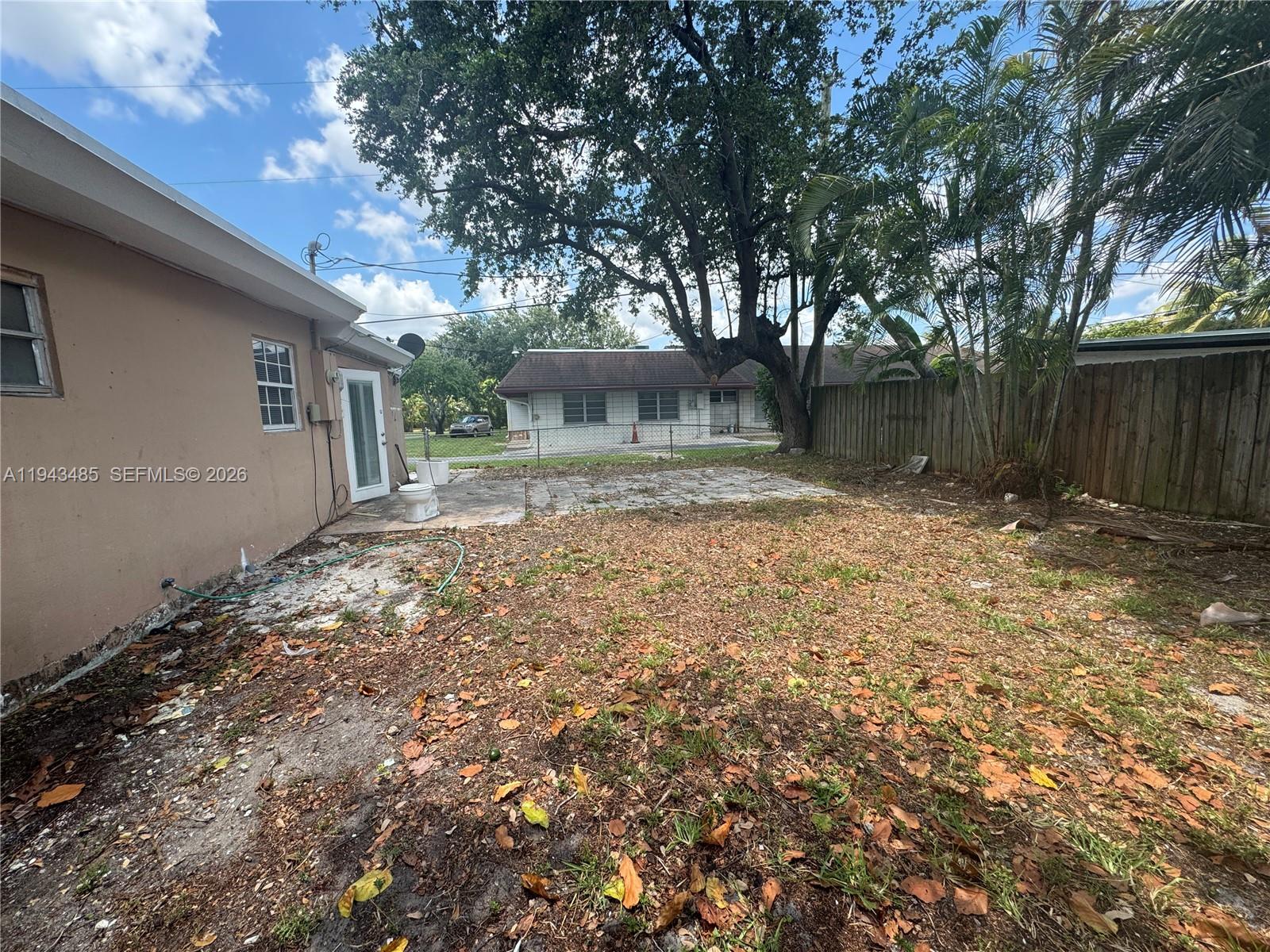 5819 Moseley Street Hollywood, FL 33021 - Photo 14 of 15 a backyard of a house
