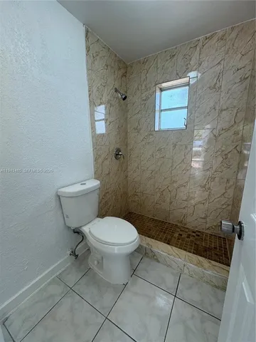 a bathroom with a toilet