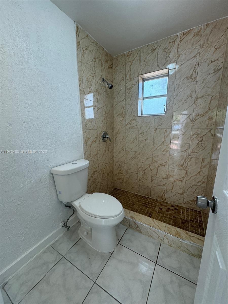 5819 Moseley Street Hollywood, FL 33021 - Photo 7 of 15 a bathroom with a toilet