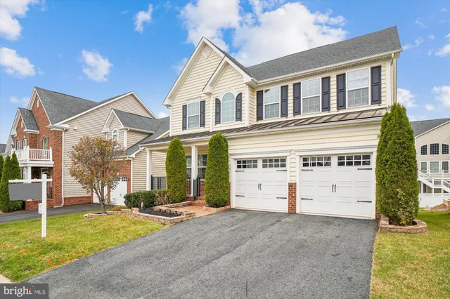 a view of a brick house with wooden floor and a window