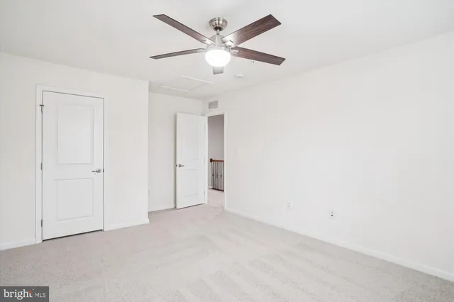 a view of a street with parking