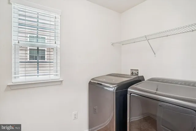 a car parked in front of a white building