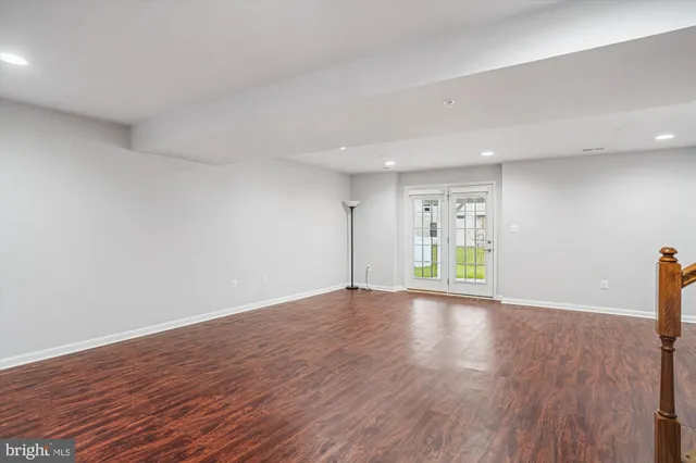 a view of a lake with houses in the back