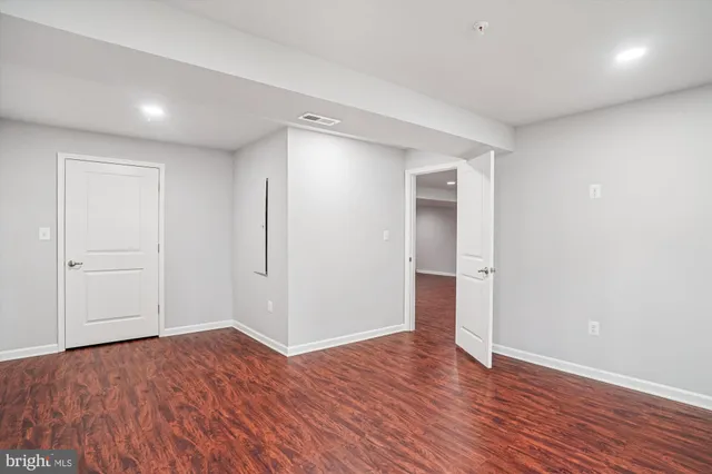 a view of a cafe with sitting area