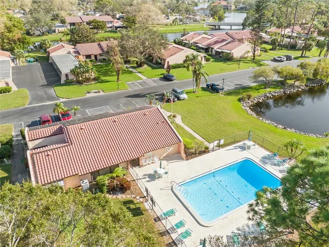 an aerial view of a house with a ocean view