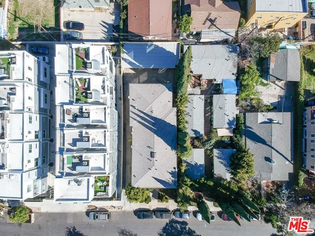 an aerial view of a city with lots of residential buildings