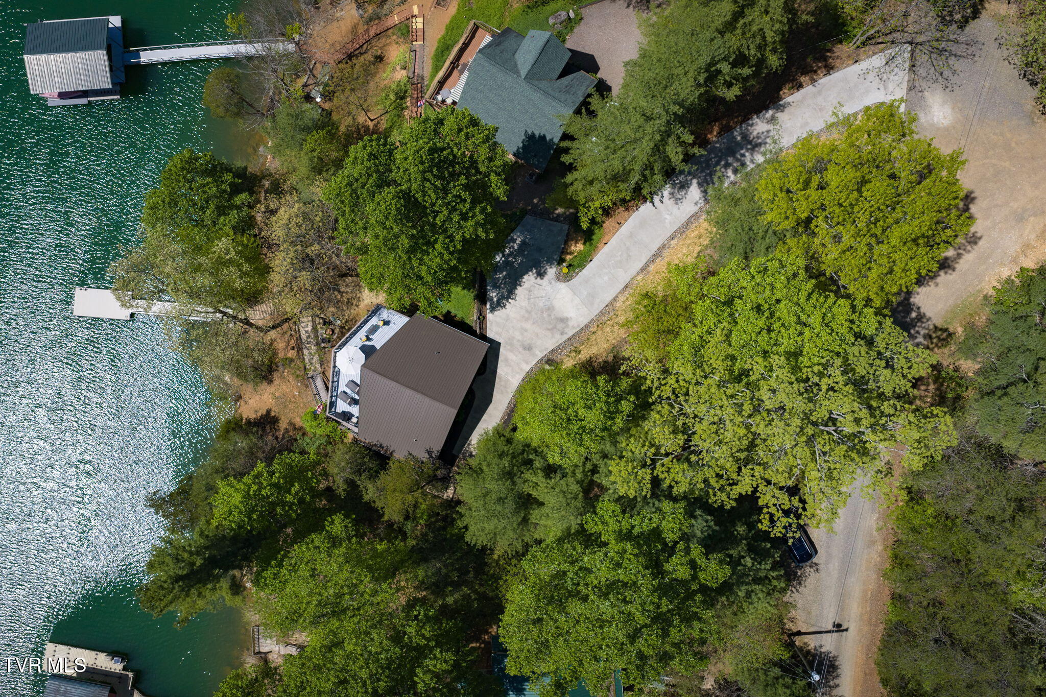 237 Candlewood Lane Butler, TN 37640 - Photo 40 of 42 Concrete driveway