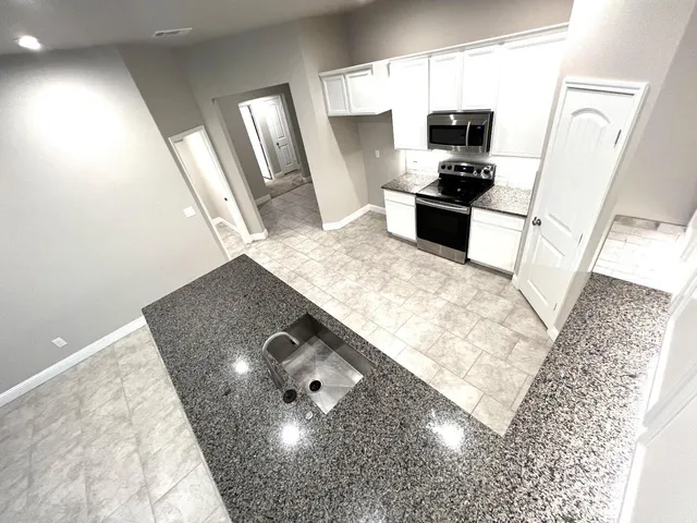 an empty room with windows