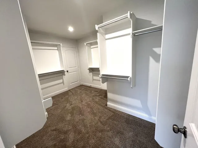 a view of walk in closet with window