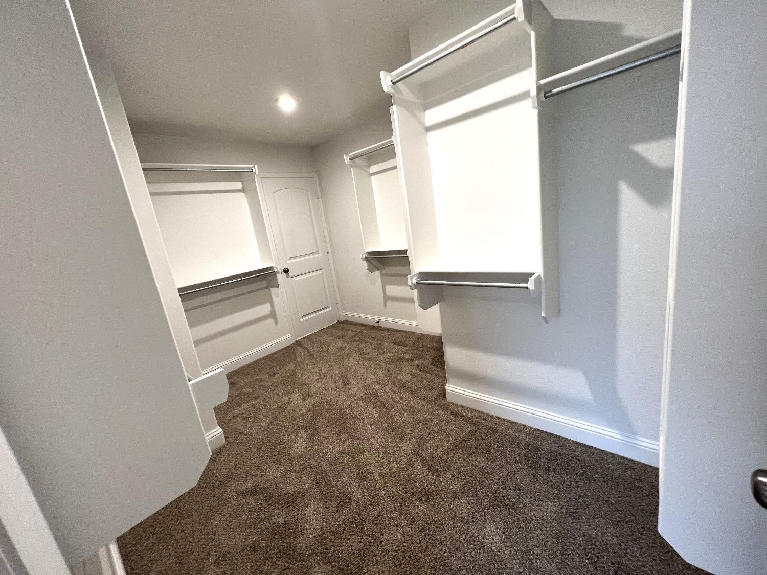 7506 100th Street Lubbock, TX 79424 - Photo 22 of 23 a view of walk in closet with window