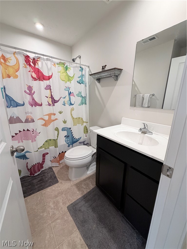 177 Raintree Lane Painesville, OH 44077 - Photo 13 of 40 Full bath with vanity and light tile patterned floors