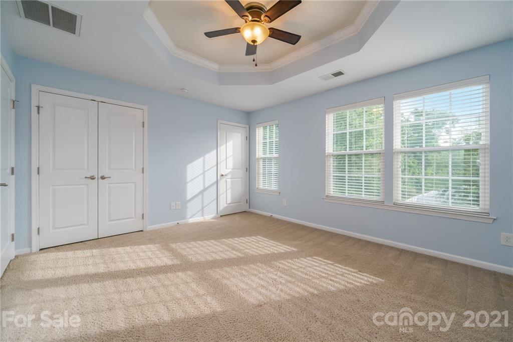 7304 Copper Beech Trace, Unit 13 Charlotte, NC 28273 - Photo 18 of 25 a view of an empty room with a window