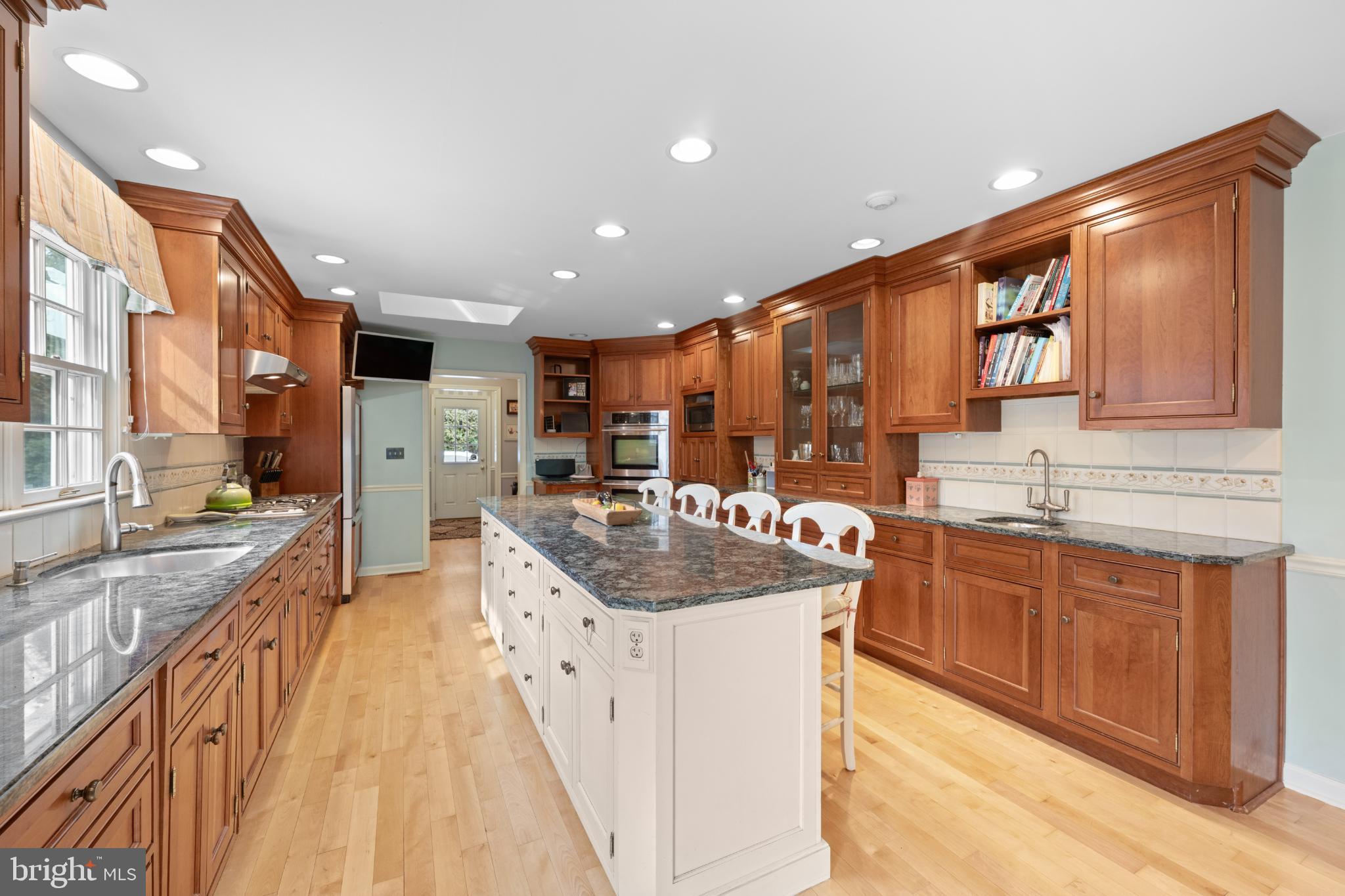 714 Gulph Road Wayne, PA 19087 - Photo 36 of 48 Spacious kitchen with elegant wood cabinetry.