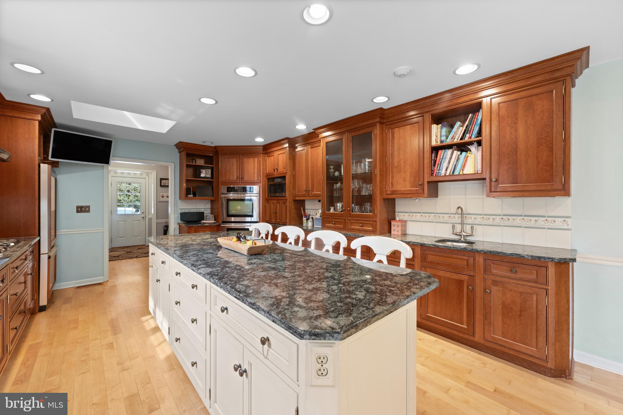 714 Gulph Road Wayne, PA 19087 - Photo 37 of 48 Elegant kitchen with rich wood cabinetry.