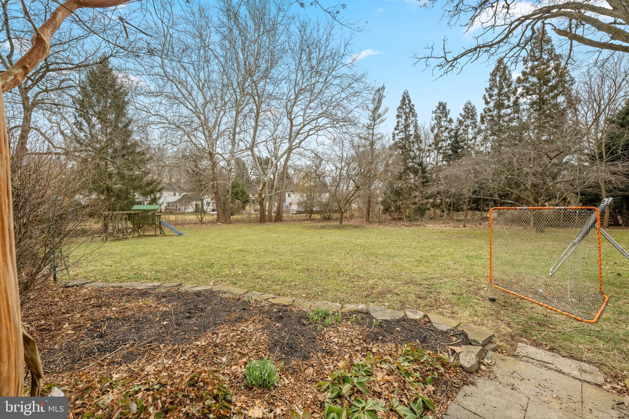 714 Gulph Road Wayne, PA 19087 - Photo 6 of 48 Spacious backyard with serene natural beauty.