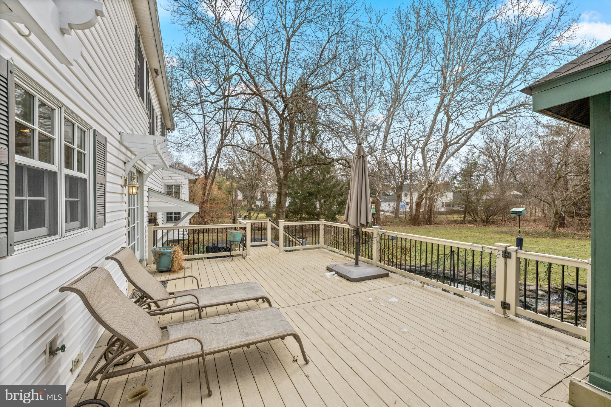 714 Gulph Road Wayne, PA 19087 - Photo 9 of 48 Spacious deck with serene backyard views.