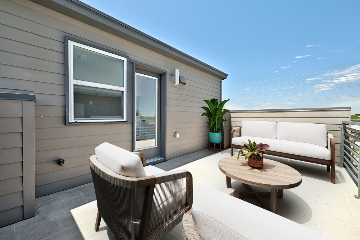 1412 Waterloo Shore Lane Austin, TX 78741 - Photo 17 of 30 a view of a patio with couches and potted plants