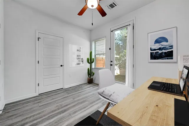 a workspace with wooden floor