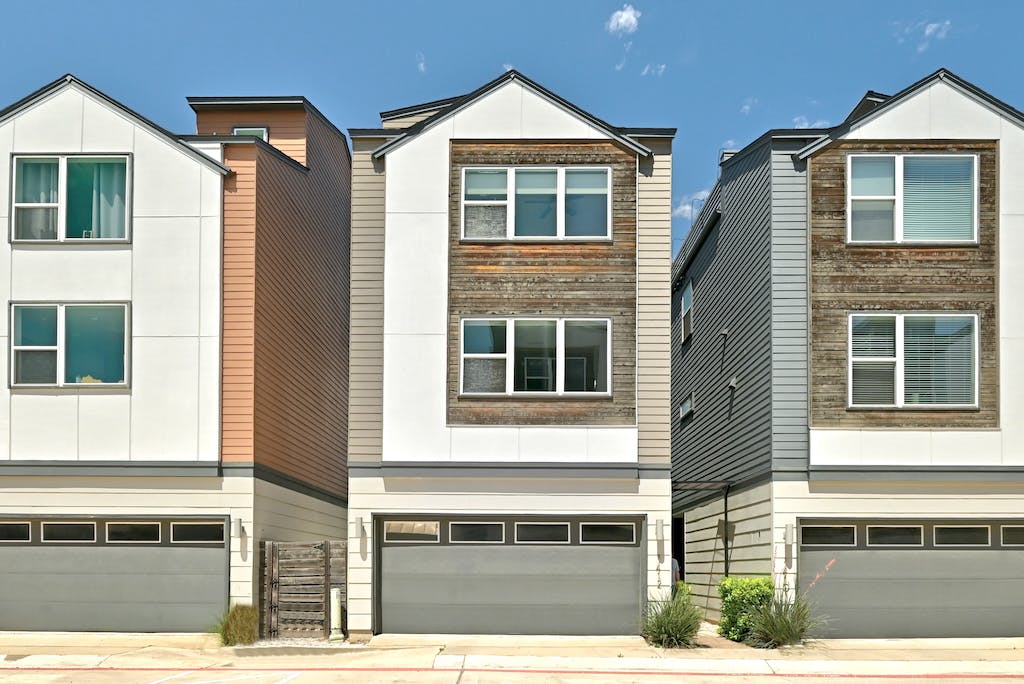 1412 Waterloo Shore Lane Austin, TX 78741 - Photo 2 of 30 a front view of a house with a yard