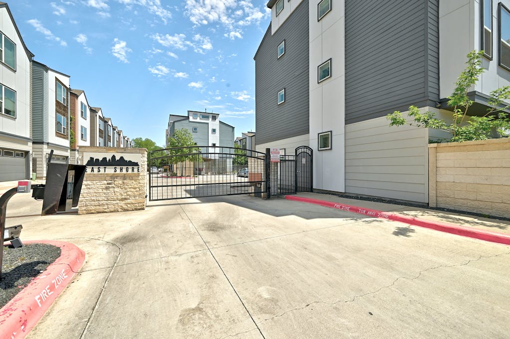 1412 Waterloo Shore Lane Austin, TX 78741 - Photo 28 of 30 a view of parking space in front of a building
