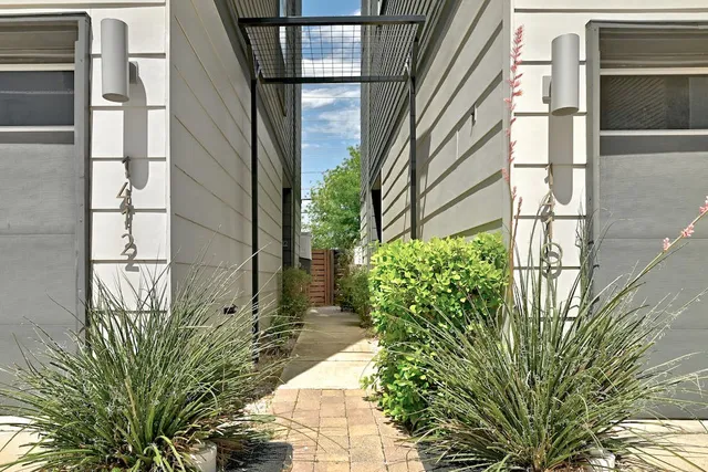 a view of a back yard of a building