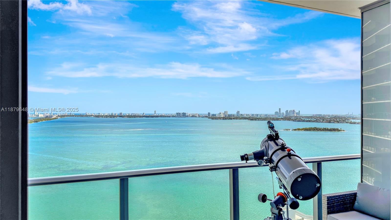 480 Northeast 31st Street, Unit 2407 Miami, FL 33137 - Photo 5 of 35 a view of a lake from a balcony