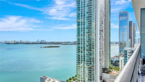 a view of a balcony next to a lake view