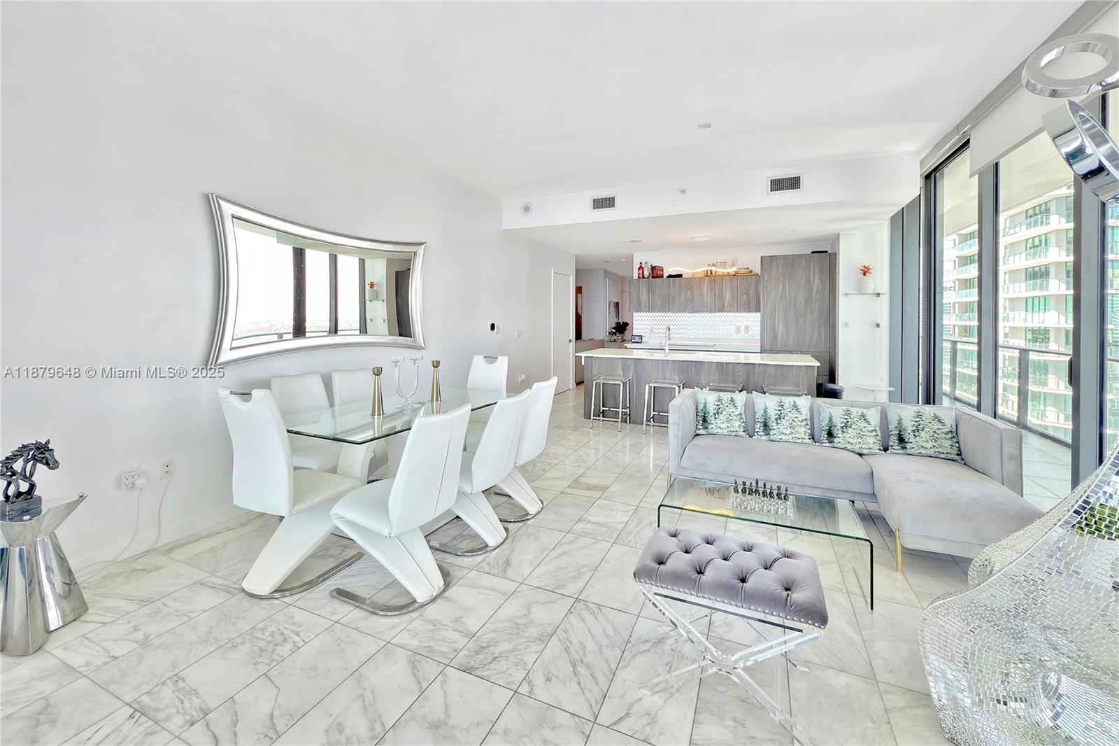 480 Northeast 31st Street, Unit 2407 Miami, FL 33137 - Photo 10 of 35 a living room with furniture and a large window