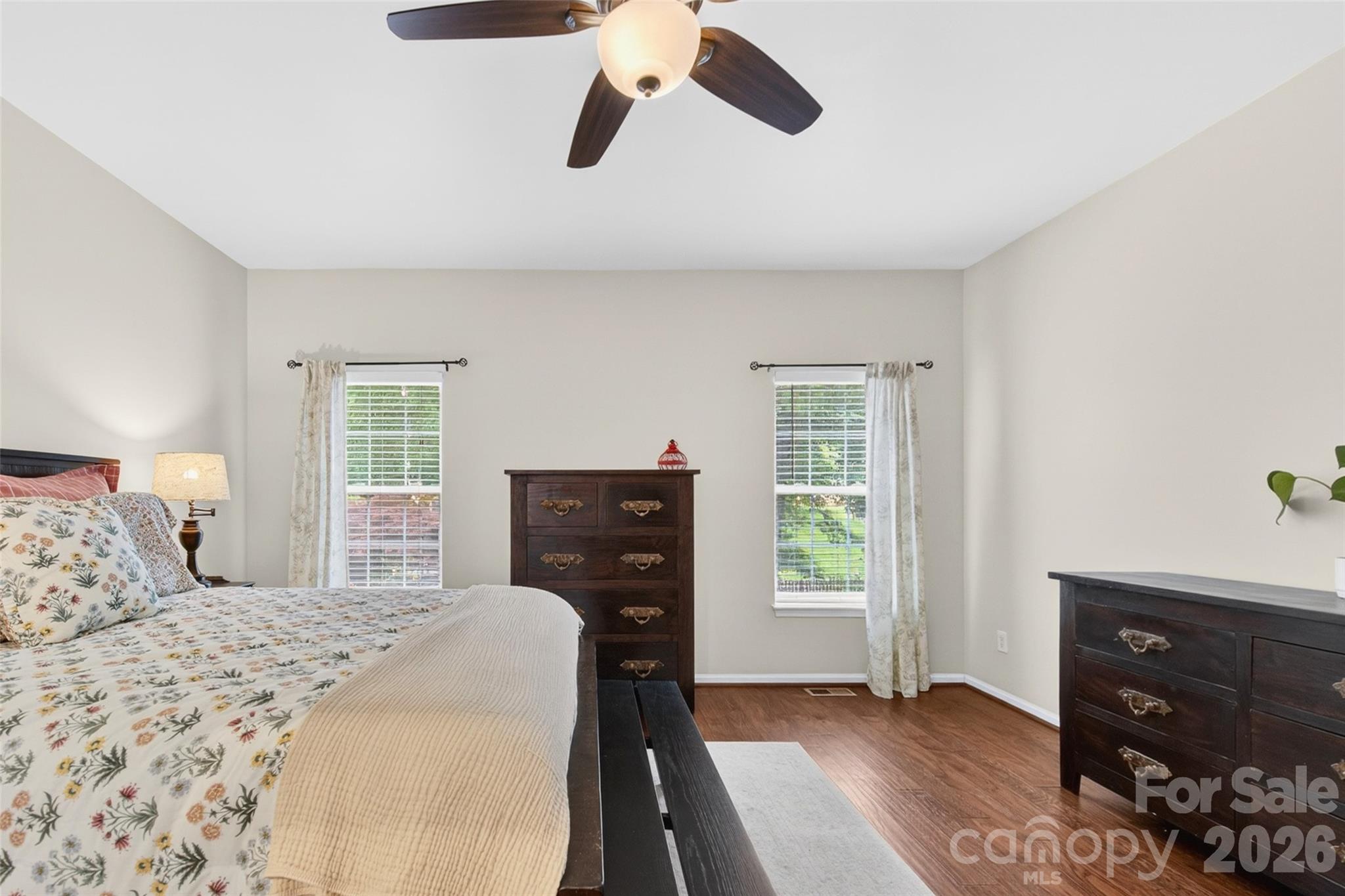 10502 Hellebore Road Charlotte, NC 28213 - Photo 19 of 48 a bedroom with a bed and a window