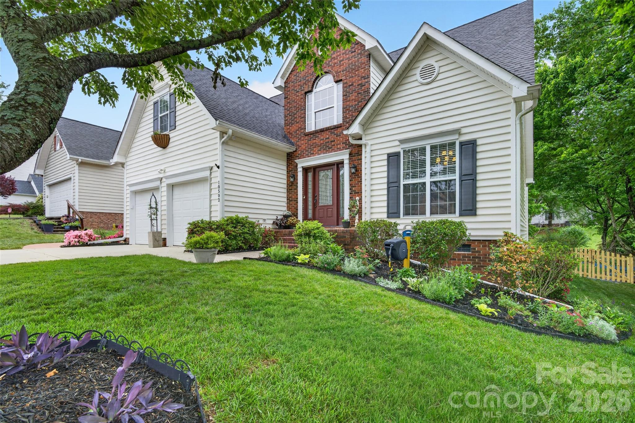 10502 Hellebore Road Charlotte, NC 28213 - Photo 2 of 48 a view of a house with a yard