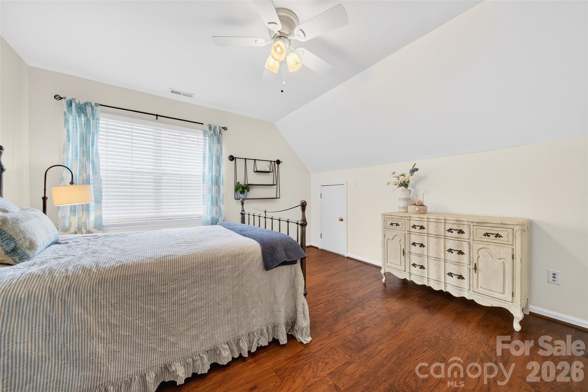 10502 Hellebore Road Charlotte, NC 28213 - Photo 27 of 48 a bedroom with a bed dresser and a window