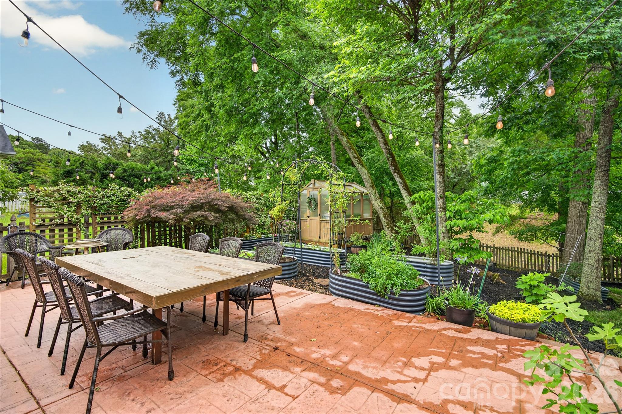 10502 Hellebore Road Charlotte, NC 28213 - Photo 39 of 48 a view of a chairs and table in the patio
