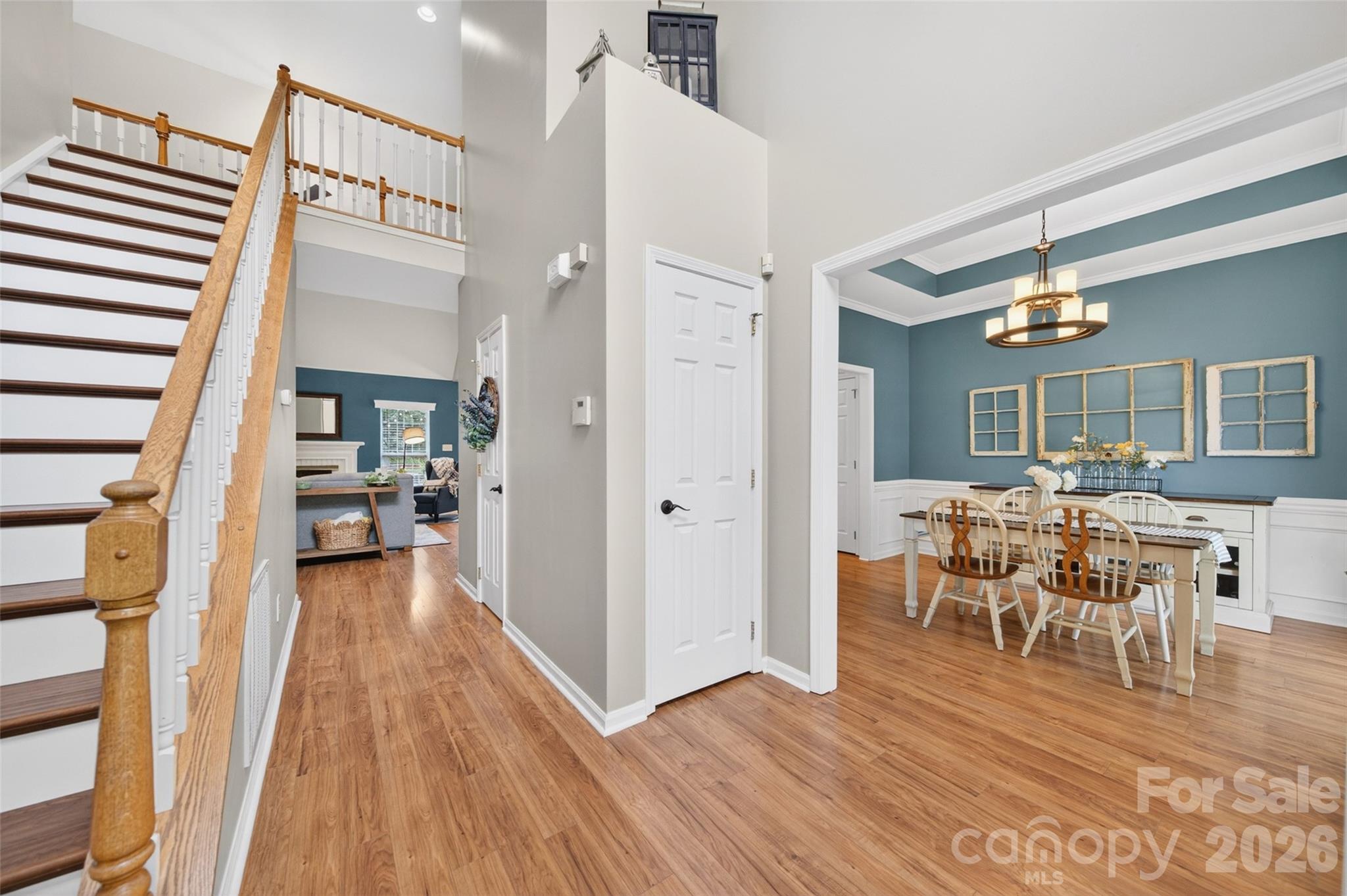10502 Hellebore Road Charlotte, NC 28213 - Photo 4 of 48 a view of a dining room with furniture and wooden floor