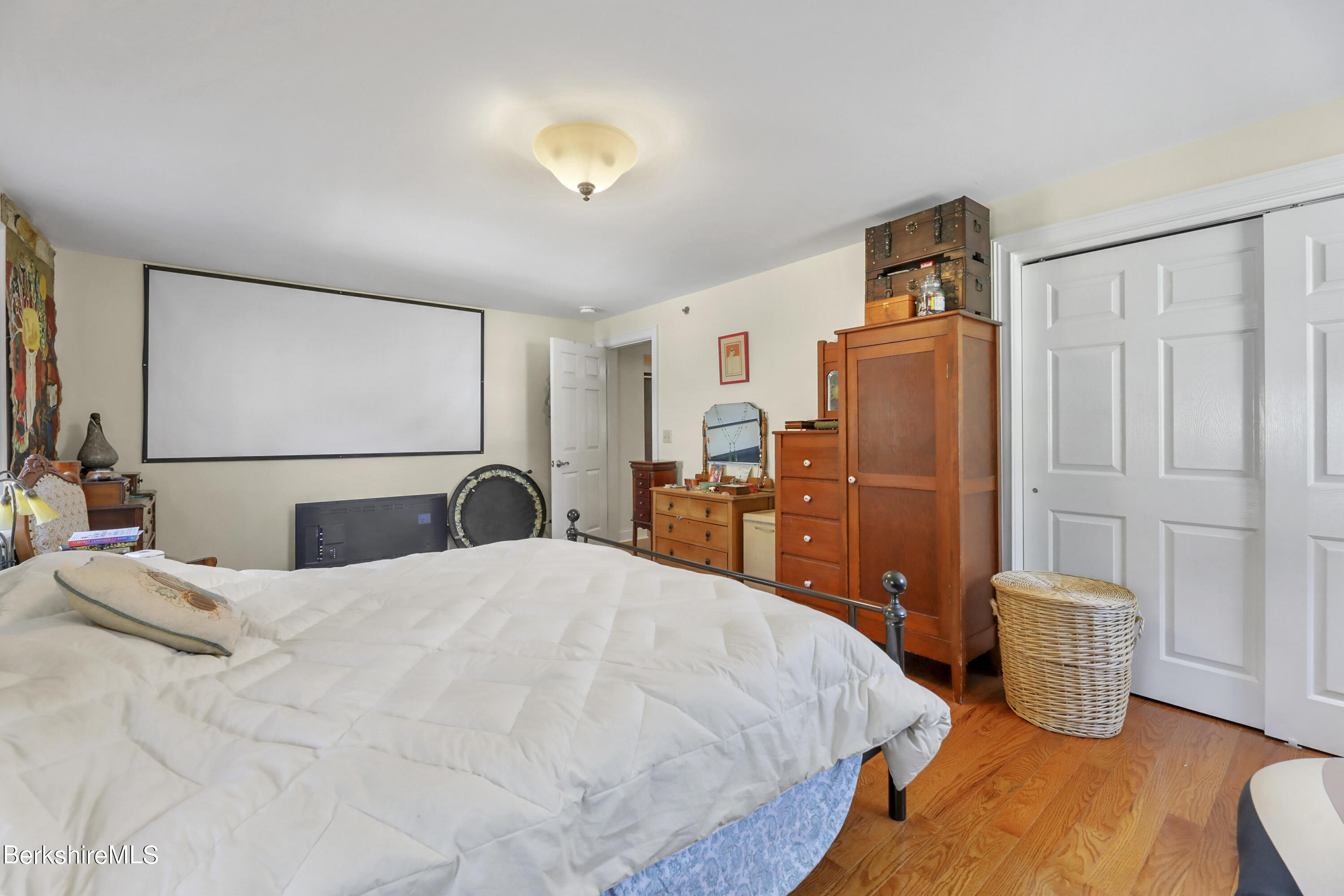 29 Main Street West Stockbridge, MA 01266 - Photo 28 of 51 a bedroom with bed and wooden floor