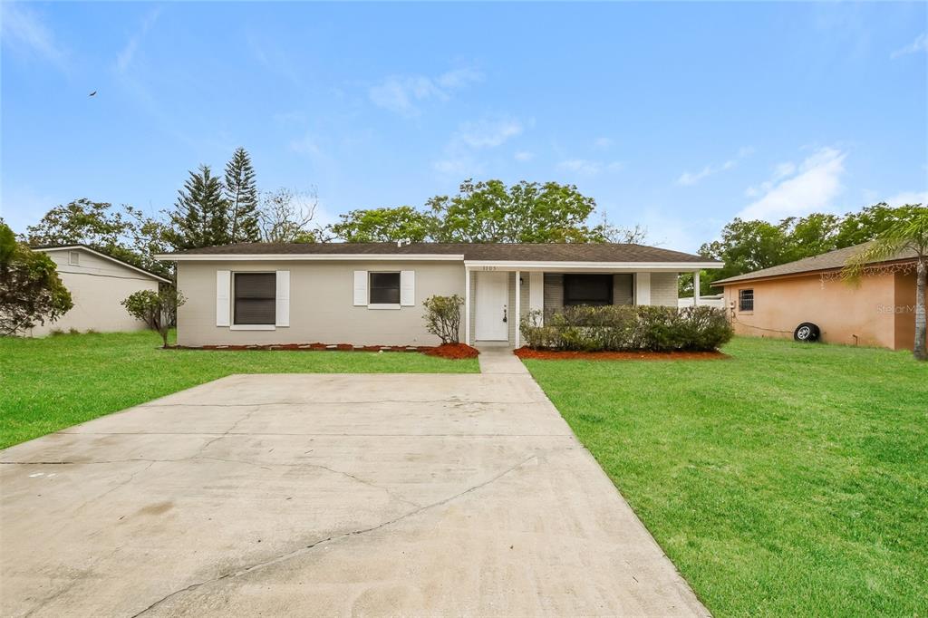 1105 Bellini Lane Ocoee, FL 34761 - Photo 1 of 1 a view of outdoor space yard and front view of house