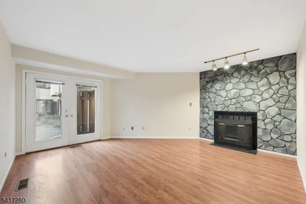 a kitchen with a refrigerator stove and microwave