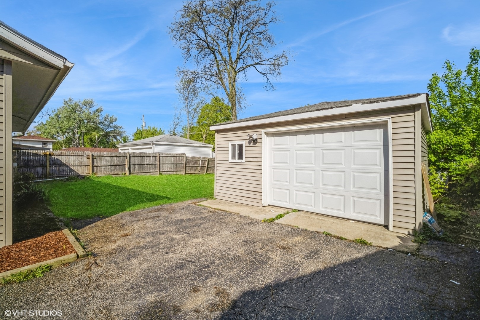 504 Isa Drive Wheeling, IL 60090 - Photo 12 of 13 a view of a house with a yard