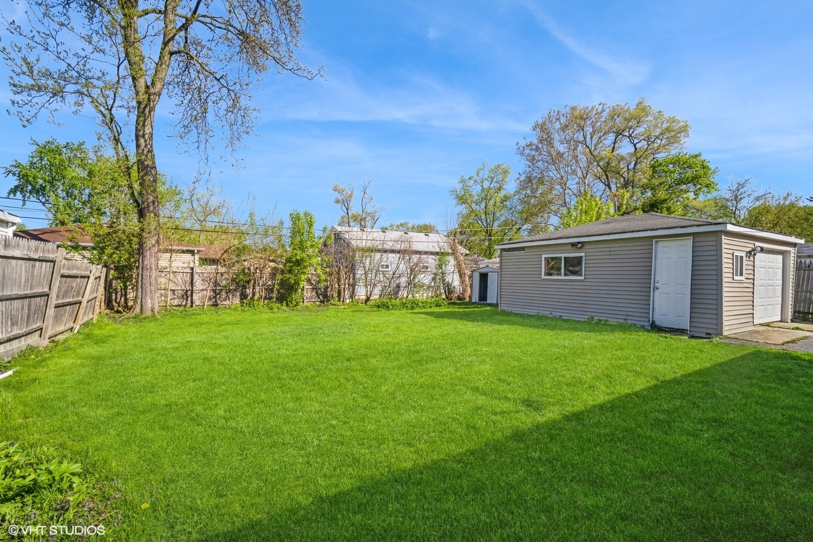 504 Isa Drive Wheeling, IL 60090 - Photo 13 of 13 a view of a house with backyard and a tree