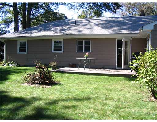 4 Peeptoad Road Warwick, RI 02888 - Photo 11 of 11 Exterior Back. nice flat yard with room for games, plants, dogs?