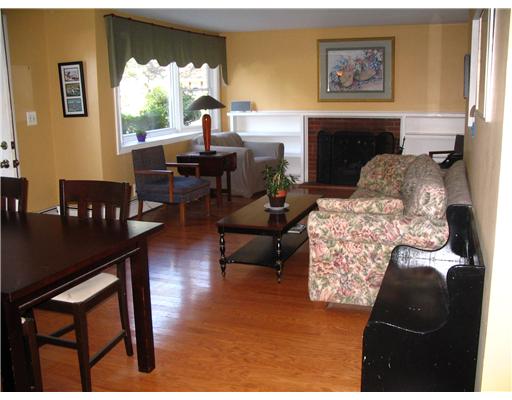 4 Peeptoad Road Warwick, RI 02888 - Photo 2 of 11 Living Room. Roomy combination or not fireplaed dining and livingroom with pretty hardwoods! Painted walls thru out!