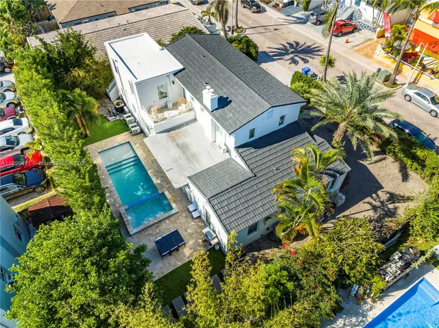 a view of a small pool with an outdoor space