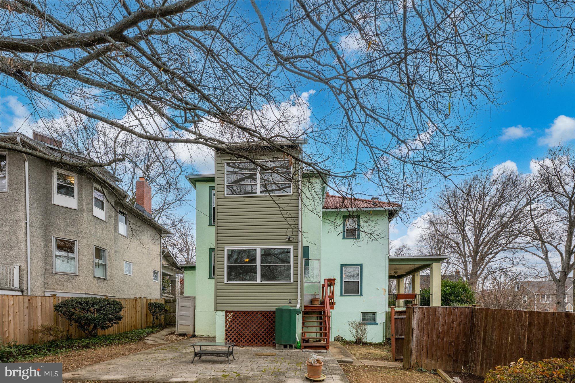 3206 Morrison Street Northwest Washington, DC 20015 - Photo 16 of 17 a front view of a house with a tree