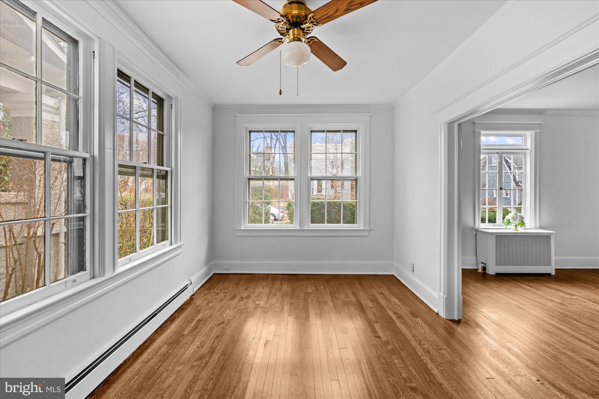 3206 Morrison Street Northwest Washington, DC 20015 - Photo 5 of 17 wooden floor in an empty room with a window