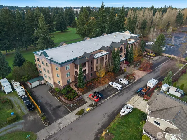 an aerial view of a house with a garden