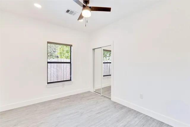 an empty room with windows