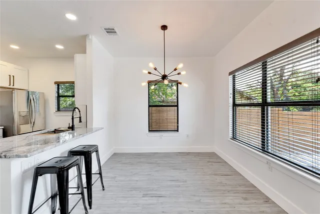 a dining room with window