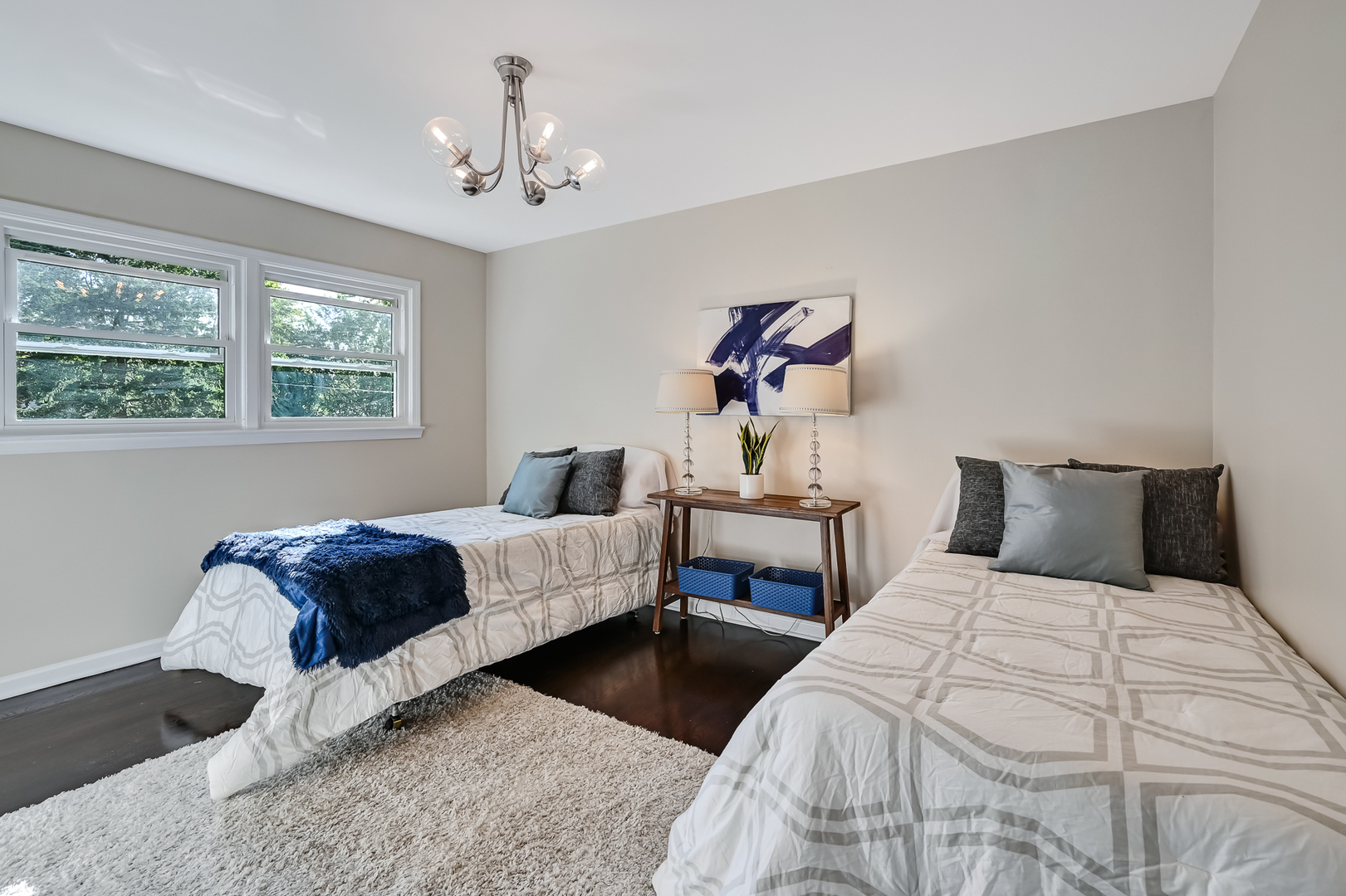 6725 Richmond Avenue Darien, IL 60561 - Photo 10 of 25 a bedroom with bed and a chandelier