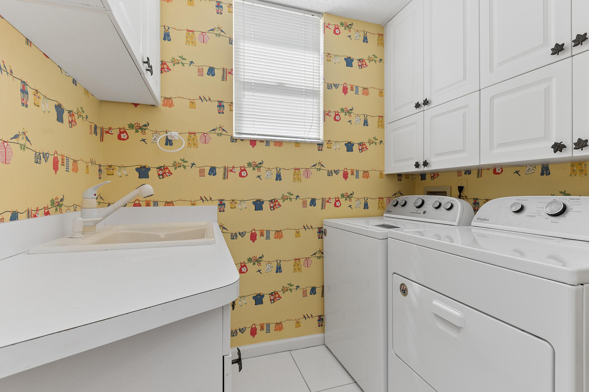 6628 Northwest 24th Avenue Boca Raton, FL 33496 - Photo 14 of 16 Laundry Room