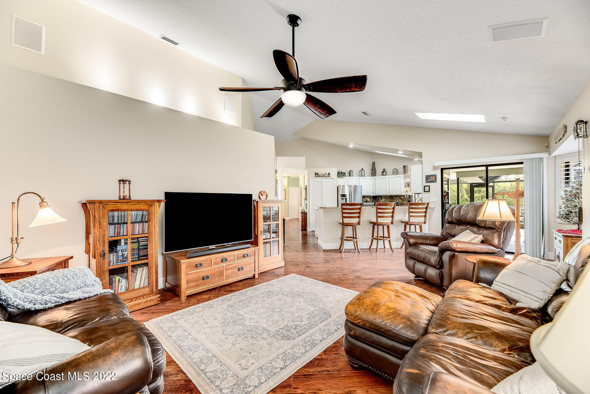 3500 Corey Road Malabar, FL 32950 - Photo 29 of 122 a living room with furniture and a flat screen tv